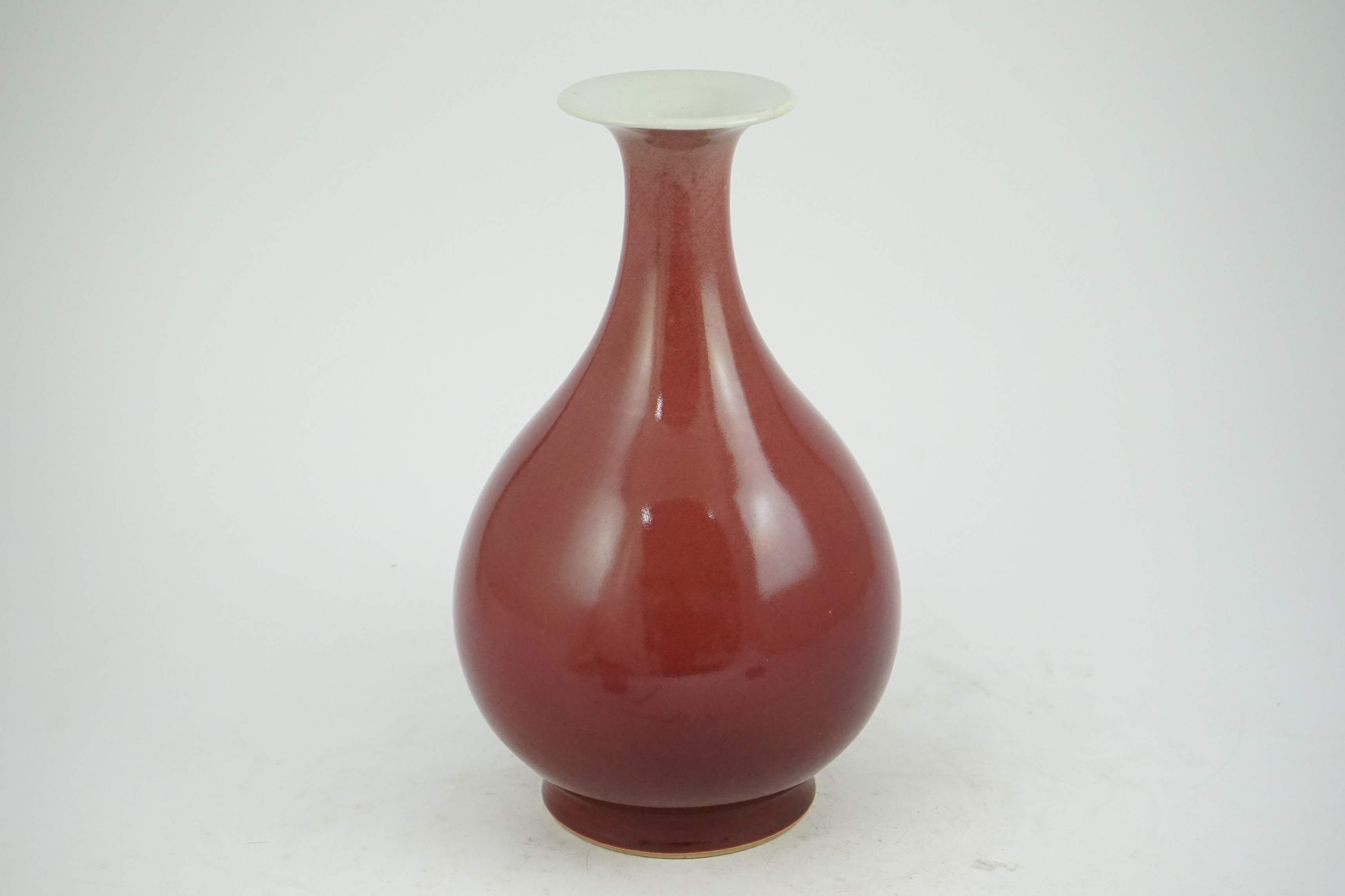 A Chinese sang-de-boeuf glazed pear shaped vase, yuhuchunping, 18th century